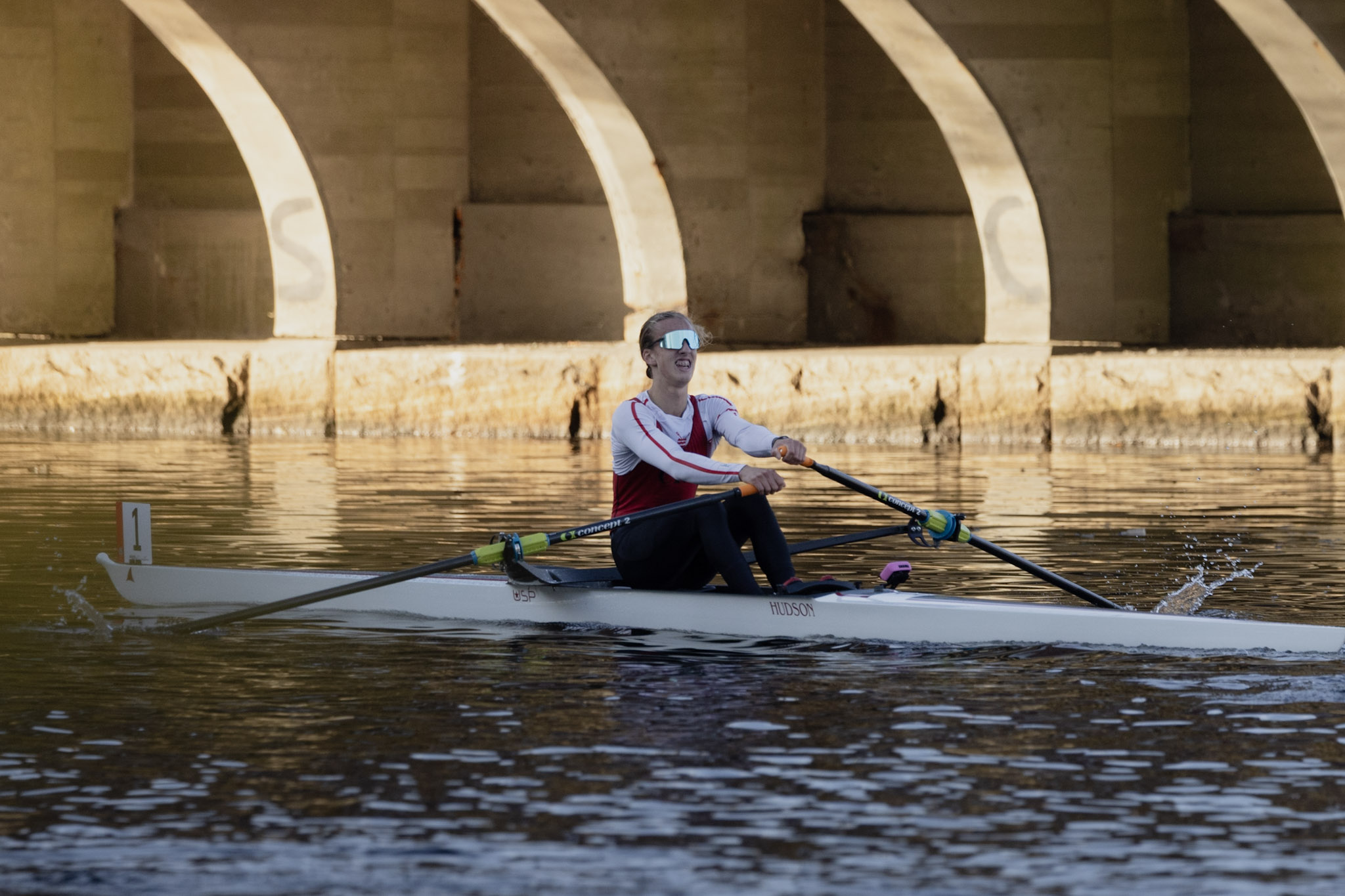 Simeon John races through a bridge in his single